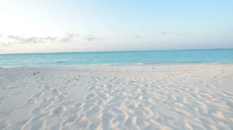 Running towards ocean beach waves in the Bahamas Video stock 38378921