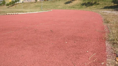 Running track red stripe Vídeos de archivo 342610882