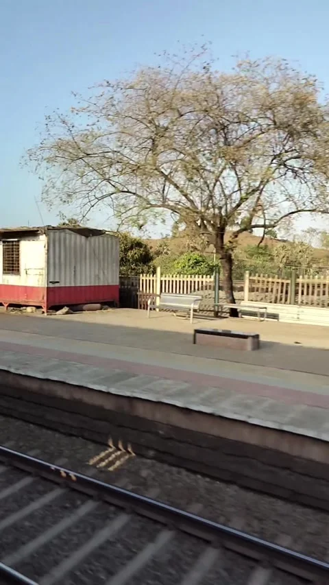 A running train in motion, scenery flashing outside the window Stock Footage 293199822