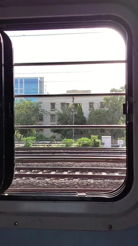 A running train in motion, scenery flashing outside the window 動画素材 293199824