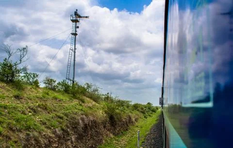 Running train side view with railway track looking awesome Stock Photos