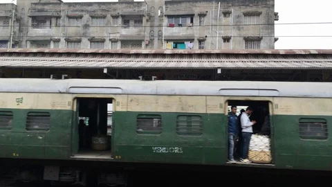 Running  Train through suburb area Stock Footage 100503096