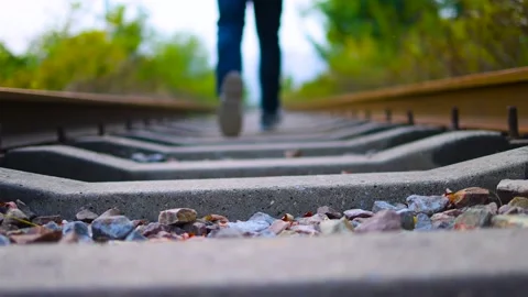 Running on the train track Stock Footage 164633966