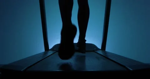 Running on a treadmill Stock Footage 314502300