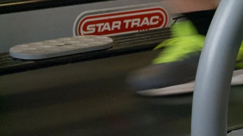 Running on a treadmill in the gym in slow motion Stock Footage 113205708