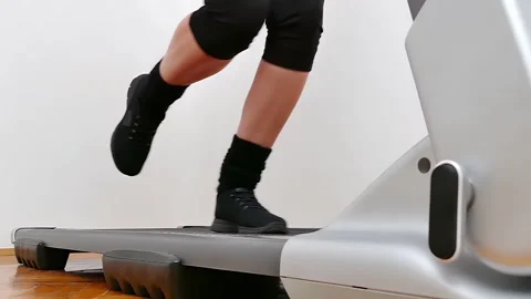 Running on a Treadmill in Slow Motion Stock-Footage 260304361