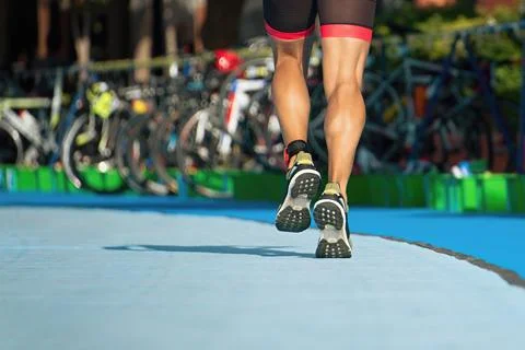 Running triathlete in the transition Stock Photos