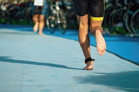 Running triathlete in the transition zone Stock Photos