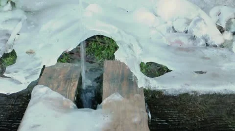 Running water and ice Stock Footage 10317939