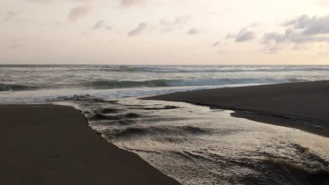 Running water on the beach Stock Footage 242034907