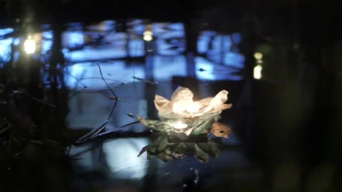 Running water flashlight. The glow of lanterns on the water. Stock Footage 96085987