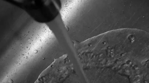 Running water out of kitchen sink Video stock 45593597