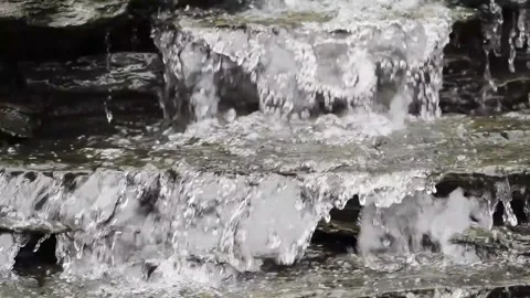 Running water over rocks slow motion Stock Footage 282302779