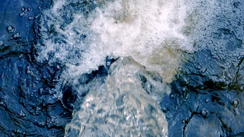 Running of water stream from waterfall, top view Stock Footage 89994294