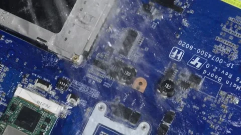 Running water through Printed circuit board. Stock Footage 221033020