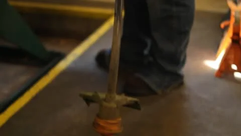 Running weedwhacker trimmer in shop Stock-Footage 10587512