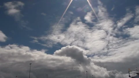 Running white clouds in blue sky background. Accelerated video. Timelapse. Stock Footage 92556938