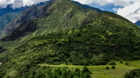 Running white clouds over green mountain  and valley. Stock Footage 41194894