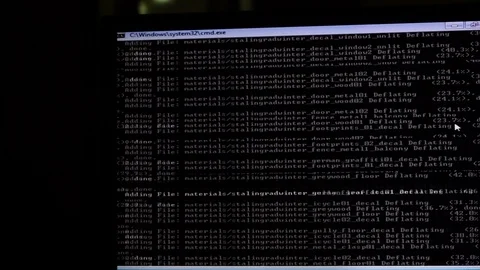 Running white lines on a black computer screen Stock Footage 94711073