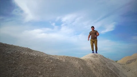 Running workout at the gravel pit Stock Footage