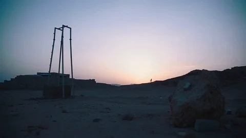 Runs on the desert at sunset Video stock 89850110