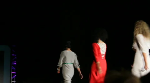 Runway Models Follow Designer Down Catwalk Stock-Footage 737926