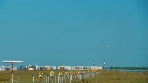 Runway with two aircraft preparing to land Stock Footage 92207273