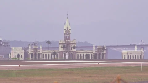 Runway view of starting Plane in front of Ilha Fiscal Stock Footage 64865067