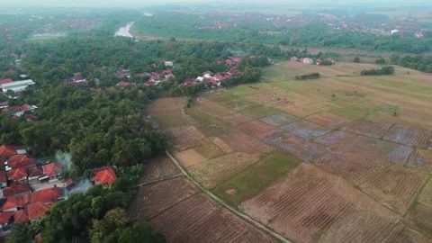 A rural area with a river running through it. 스톡 동영상 319110371