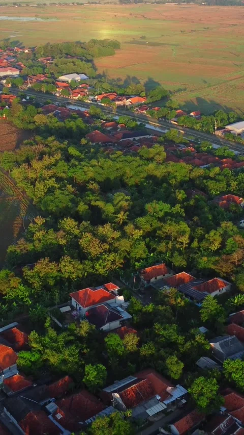 A rural area with a small town in the middle Stock Footage 319027636