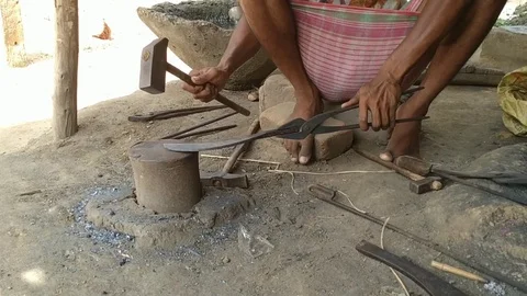 Rural Blacksmith making Billhooks Stock Footage 127146688