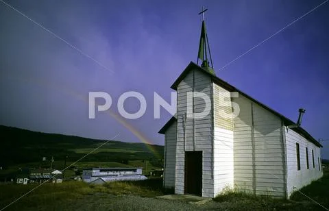 Rural church w/ rainbow at door Stock Photos