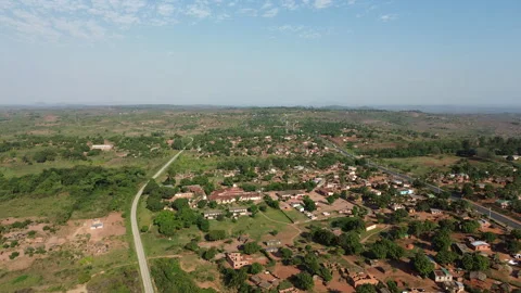 Rural development and infrastructure in Mozambique, aerial drone shot of village Stock Footage 341838182