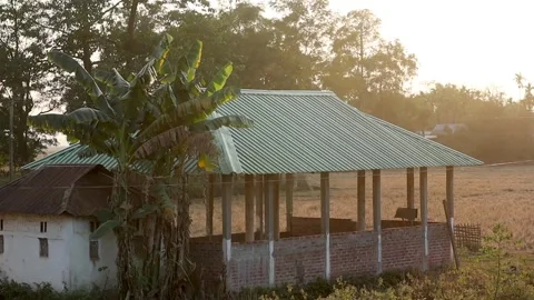 Rural Farm Structure with Green Tin Roof in Assam Countryside Stock Footage 328340904