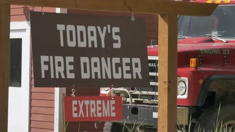 Rural Fire Engine with Extreme Danger Warning Sign Stock Footage