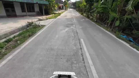 Rural Highway scene in Blora District, Central Java, Indonesia Stock Footage 335451256