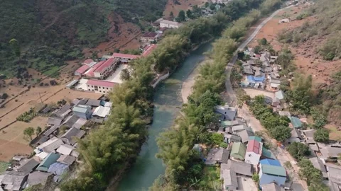 Rural Homes and Fields Beside a River in Karst Valley Stock Footage 345695004