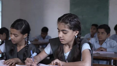 Rural Indian school students study in classroom. Elementary boys and girls .. Stock Footage 273549636