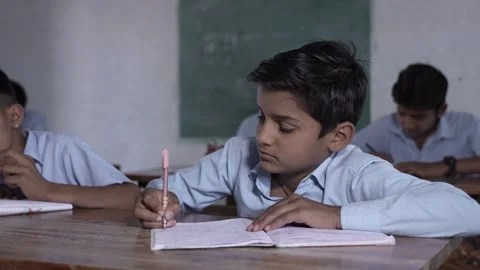 Rural Indian school students study in classroom. Elementary boys and girls .. Stock Footage 273549697
