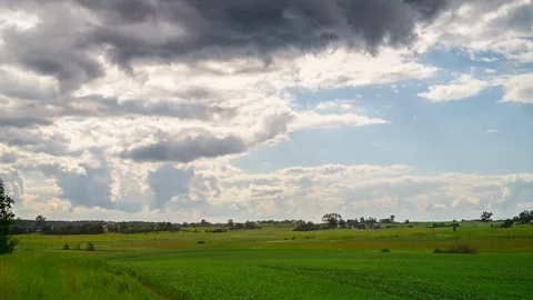 Rural landscape and rain clouds, time-lapse Stock Footage 90217265