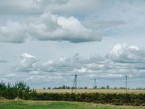 Rural Landscape with Dramatic Clouds and Power Lines 스톡 사진