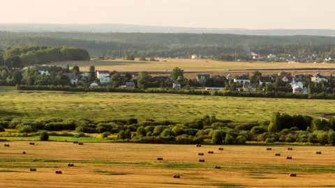 Rural landscape, drone view. Haystack and Hay in rolls at field. Stock Footage 220099154