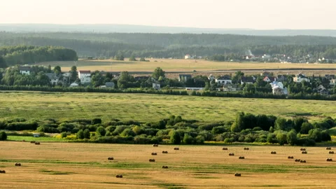 Rural landscape, drone view. Haystack and Hay in rolls at field. Stock Footage 220101610