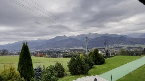 Rural Landscape with Fields and Trees Under Cloudy Sky 動画素材 344042439