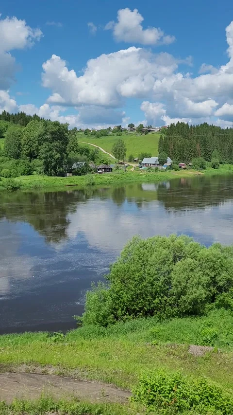 Rural landscape with river and clouds in summer. Vertical video. Video stock 278227971