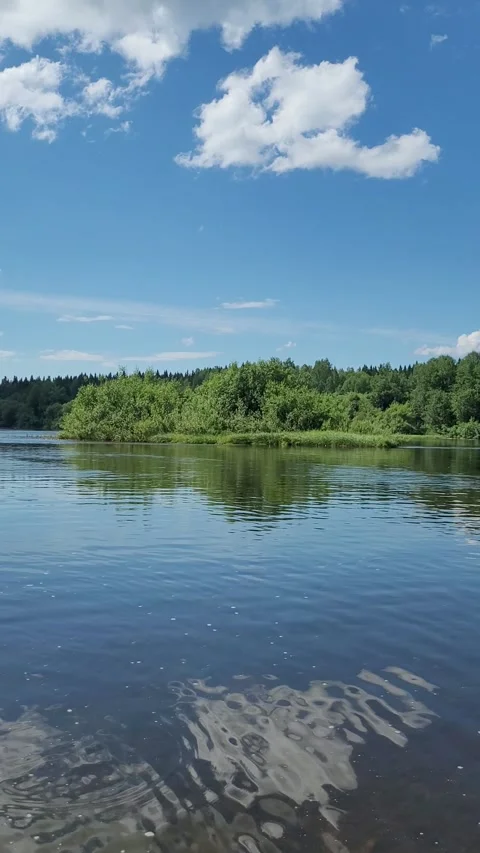 Rural landscape with river and clouds in summer. Vertical video. Stock-Footage 278964613