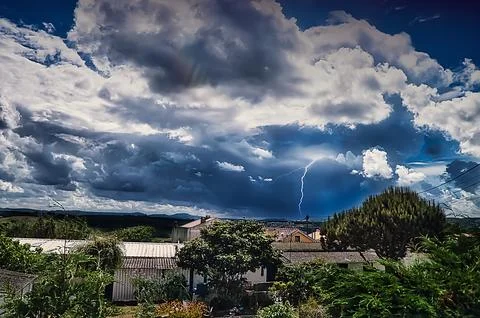 Rural landscape with storm clouds Stock Photos