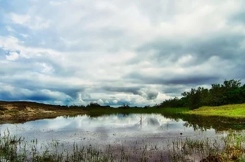 Rural landscape with storm clouds Stock Photos