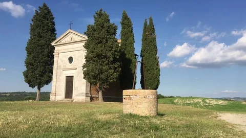Rural landscape view in 4K of a small Chapel in the Tuscany countryside Stock Footage 80157157