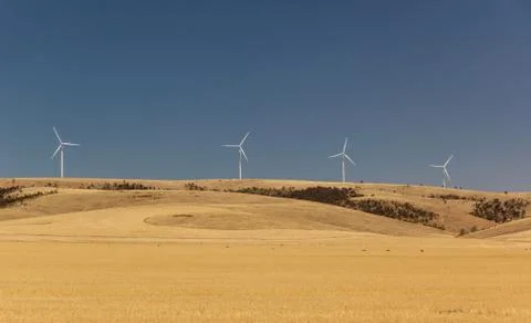 Rural landscape with wind generators distorted by hot air. south australia Foto stock